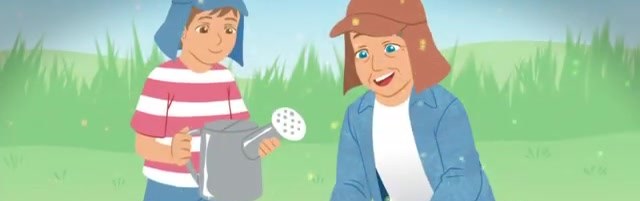 Troy holds a watering can while Grandpa kneels in the garden, both smiling.